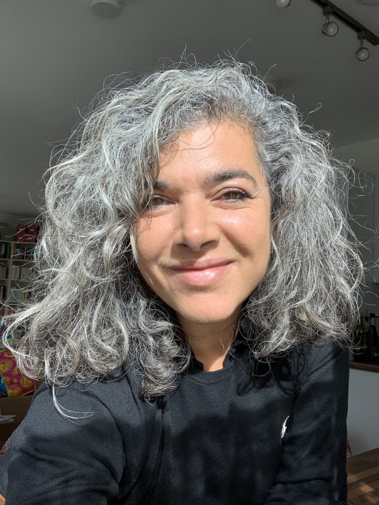 Grey and curly hair